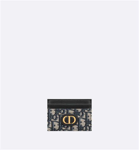 dior card holder blue|Dior card holder used.